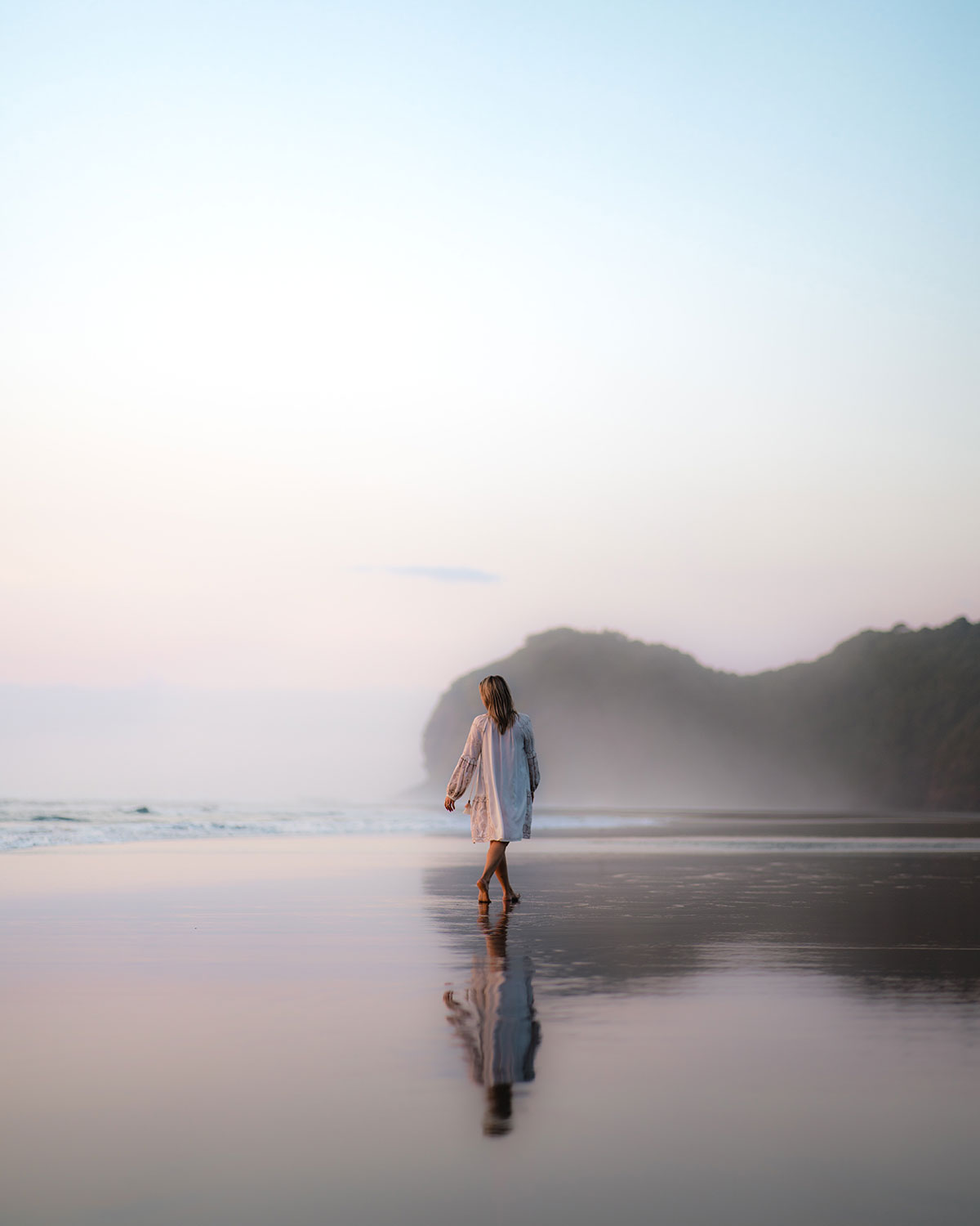 woman walking on beach